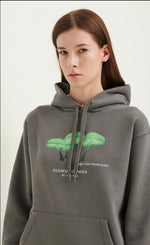 Load image into Gallery viewer, GULNOZA DILNOZA MILANO green glow mushrooms print hoodie in cotton