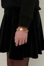 Load image into Gallery viewer, Gulnoza Dilnoza Logo chain-link bracelet in gold finish metal