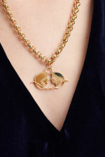 Load image into Gallery viewer, GULNOZA DILNOZA Logo pendant necklace in gold finish metal
