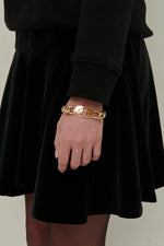 Load image into Gallery viewer, Gulnoza Dilnoza Logo chain-link bracelet in gold finish metal
