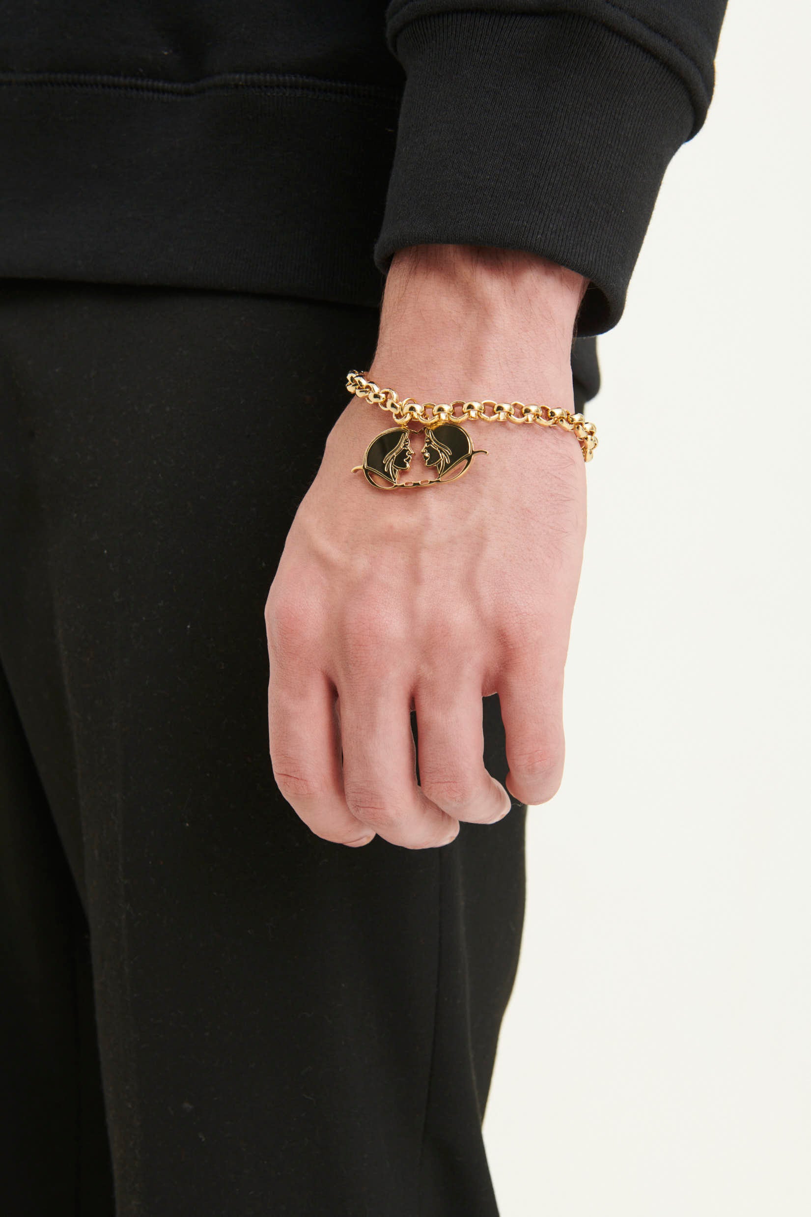 GULNOZA DILNOZA Logo pendant bracelet in gold finish metal